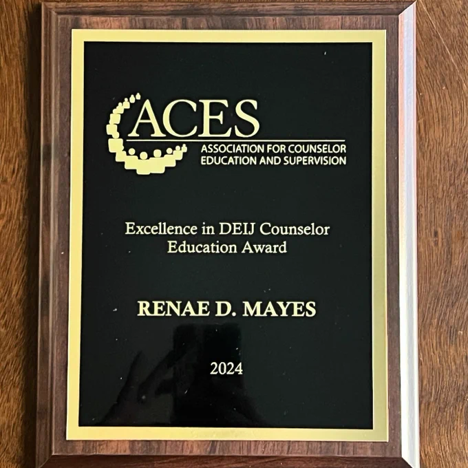 Picture of an award plaque from the Association for Counselor Education and Supervision (ACES).  The award says: Excellence in DEIJ Counselor Education Award, Renae D. Mayes 2024
