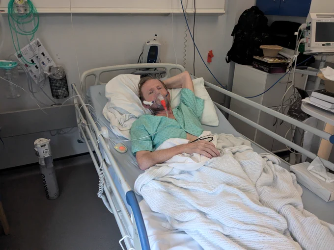Marek Marzec in a hospital bed