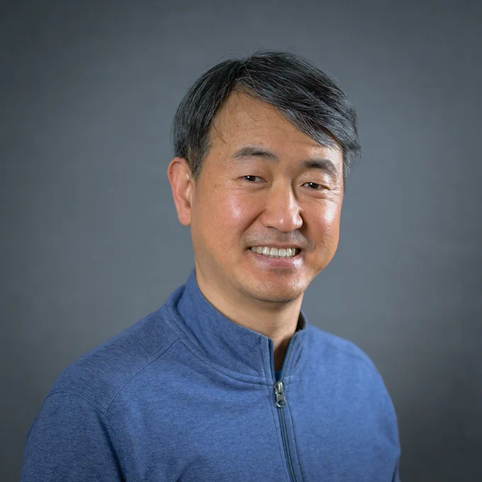 Photo of a smiling faculty member. 