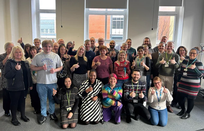 Group of digital community partners smiling with thumbs up!