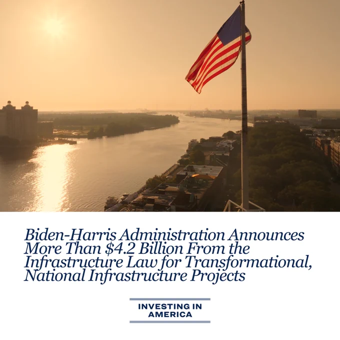 Text: Biden-Harris Administration Announces More Than $4.2 Billion From the Infrastructure Law for Transformational, National Infrastructure Projects 

Image: American Flag waving above the River in Savannah, Georgia