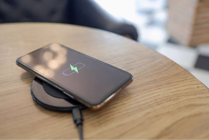 Stock image of a phone on charge