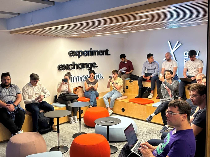 People taking part in a hackathon session at the GovTech Lab