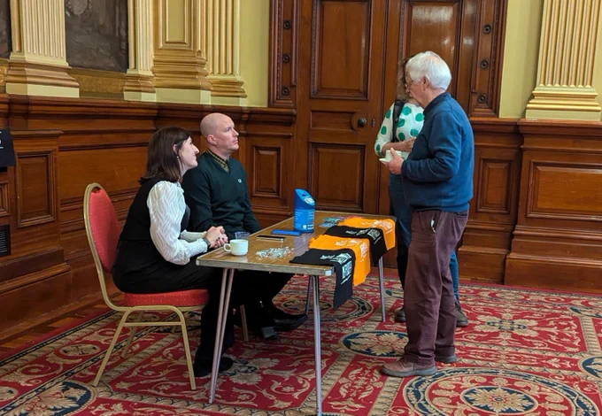 Scottish Refugee Council members chat to the fundraising team