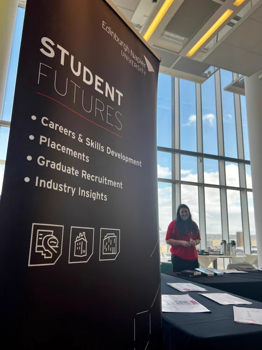 A pull up banner telling attendees about the Student Futures team.