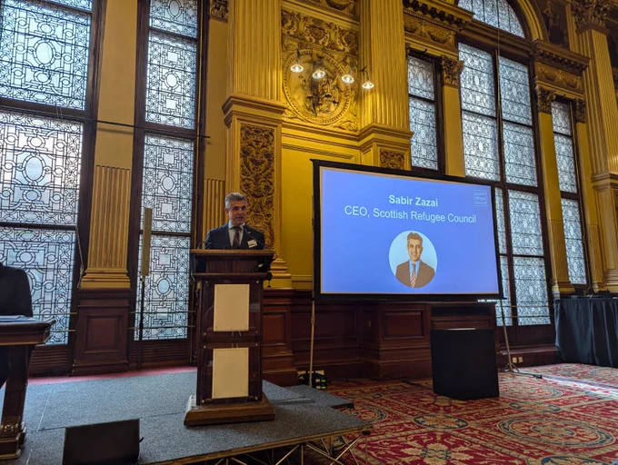 Scottish Refugee Council CEO Sabir Zazai addresses the AGM