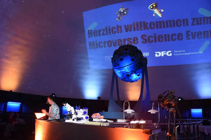 Jack Pop as the moderator of the Microverse Science Event