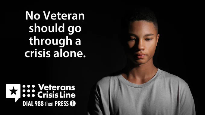 A man stares blankly alongside "No Veteran should go through a crisis alone." 