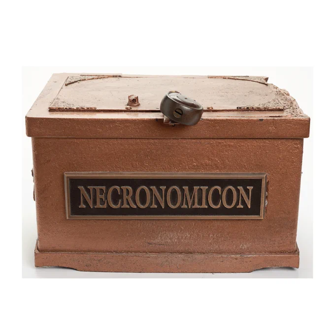 An old, brown box with a lock, inscribed with the word "Necrocomicon," suggesting mystery and intrigue.