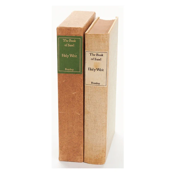 Two volumes titled "The Book of Sand / Holy Writ / Bombay" displayed on a white background, showcasing their covers and spines clearly. One is a hardcover book, and the other is a slipcase.