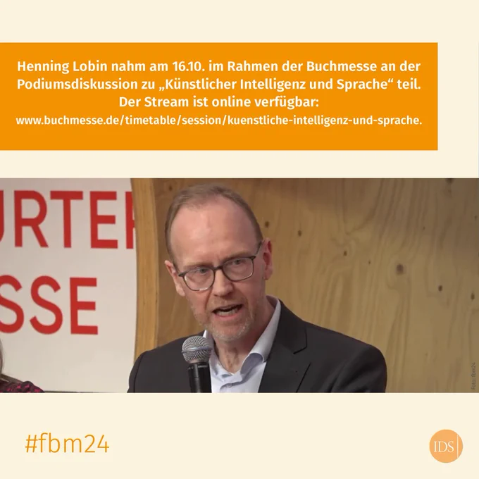 Screenshot von Henning Lobin, der in ein Mikrofon spricht.