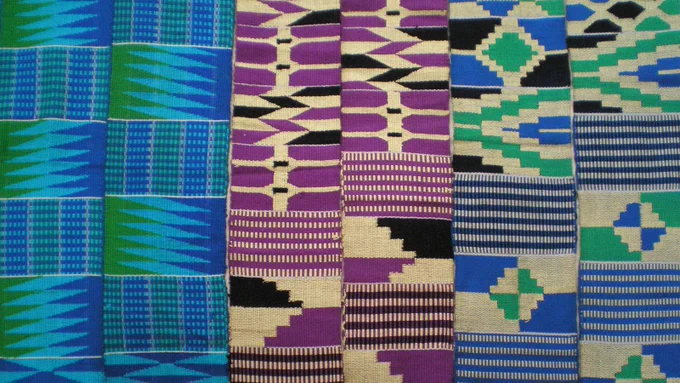 Kente cloth woven in purple green and blue