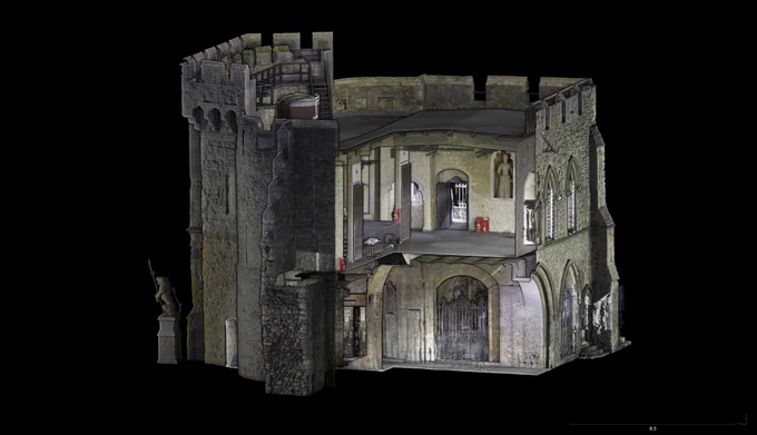  A 3D scan of the side cross-section of Bargate, highlighting its internal rooms, arches, and upper battlements. The scan exposes the internal architecture, including windows, doorways, and the intricate stonework of the exterior and interior walls. A sculpture is visible outside one of the doorways. 
Credit: University of Southampton & Southampton City Council.
