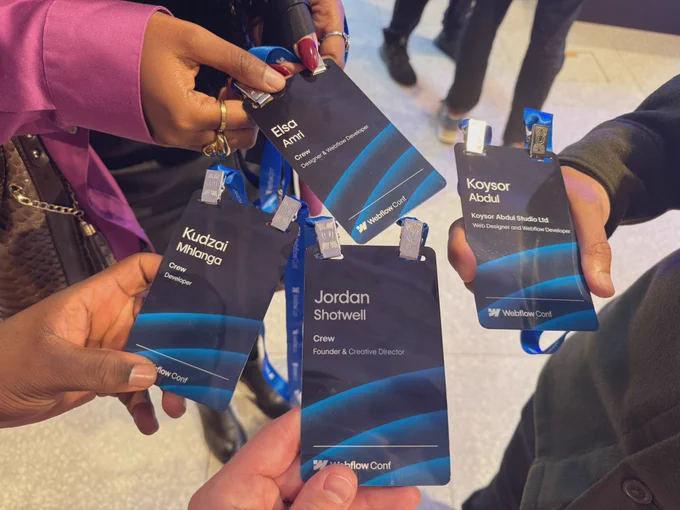 Crew team name badges at Webflow Conf