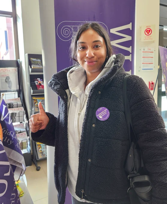Photo of student giving thumbs up for Fair Employment Week