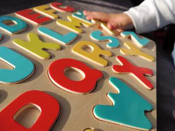 A close-up of letter blocks.