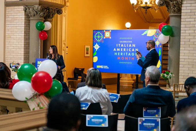 This photo shows Chancellor Aviles-Ramos speaking at a podium in the Tweed rotunda. 
