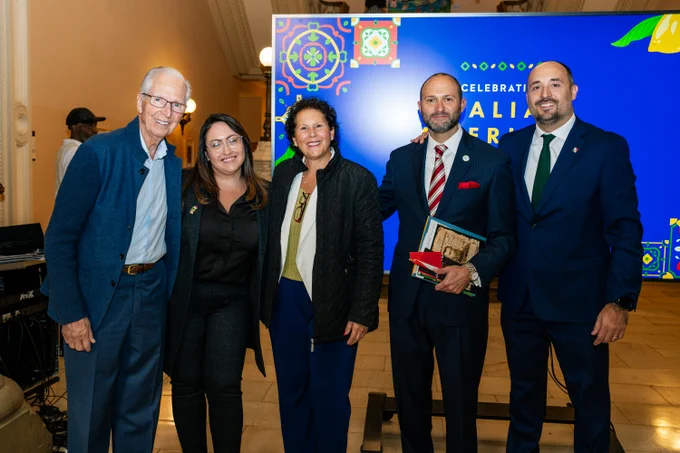 This photo shows Chancellor Aviles-Ramos posing with a group of honorees. 