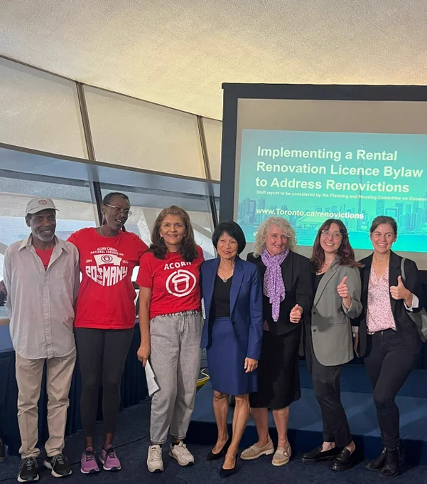 Councillor Paula Fletcher, Mayor Olivia Chow smiling for photo with housing advocates.