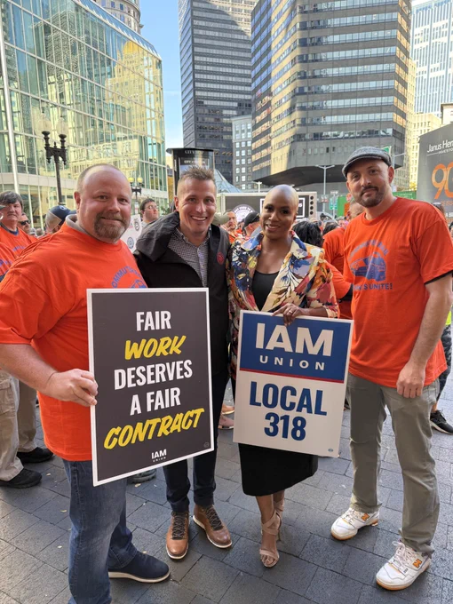 Rep. Ayanna Pressley poses for a photo with Machinists Union Local 318 leaders & members.