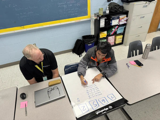 Teachers working on a math task