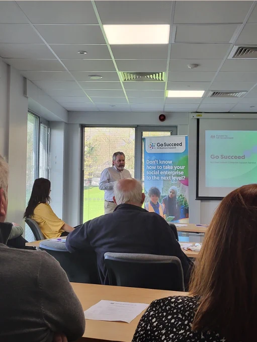 Photograph of speaker at Social Enterprise NI event