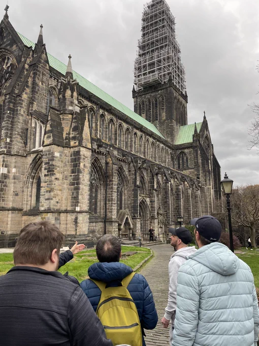 A group standing outside of Glasgow Cathedral.