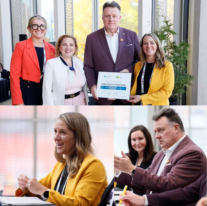 Representatives from ICLEI and Climate Proof Canada present Mayor Mike Savage and Shannon Miedema, director of Environment and Climate Change, with an award.