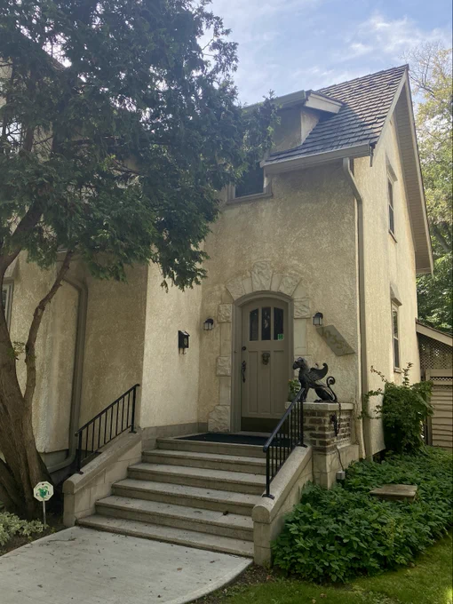 The Crawford Residence side entrance showing its offset arched entrance.


