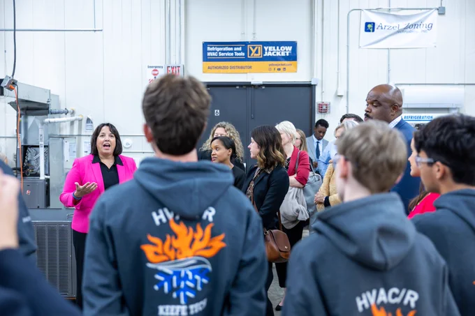 Lieutenant Governor Driscoll speaks with a group of HVAC/R students.