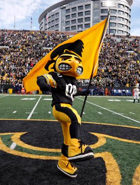 Herky holds tigerhawk flag