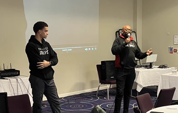 Two indivduals presenting.