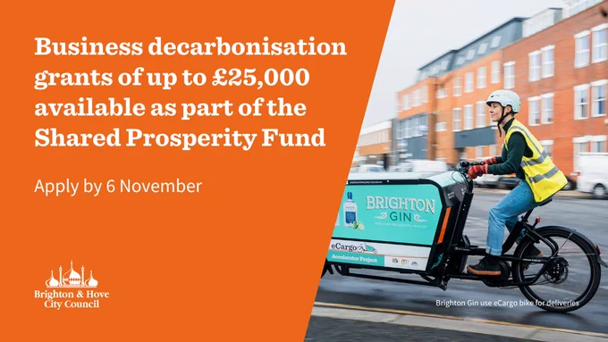 Photo of an eCargo bike next to the words - business decarbonisation grants available.