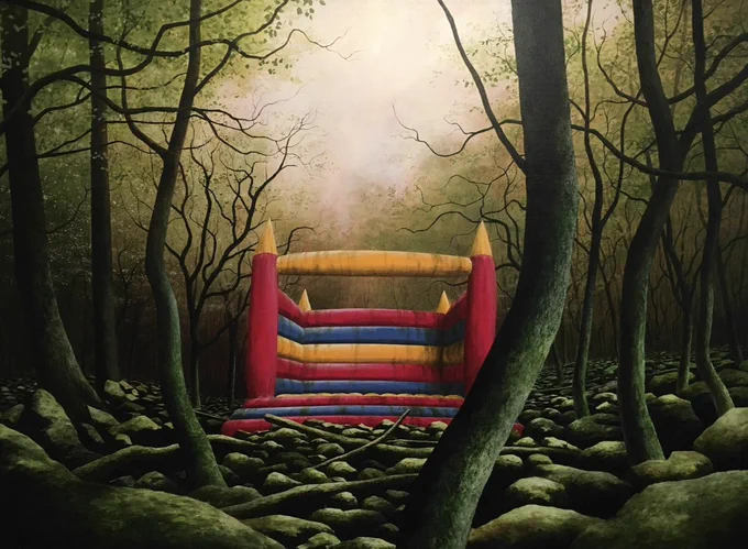 A colourful bouncy castle in a dark ancient forest.