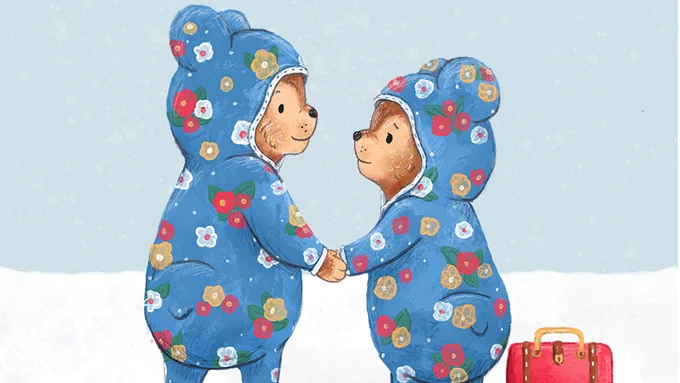 An illustration from the front cover of The Blanket Bears, featuring two bears in onesies holding hands and looking at each other; one of them has a red suitcase on the floor next to them