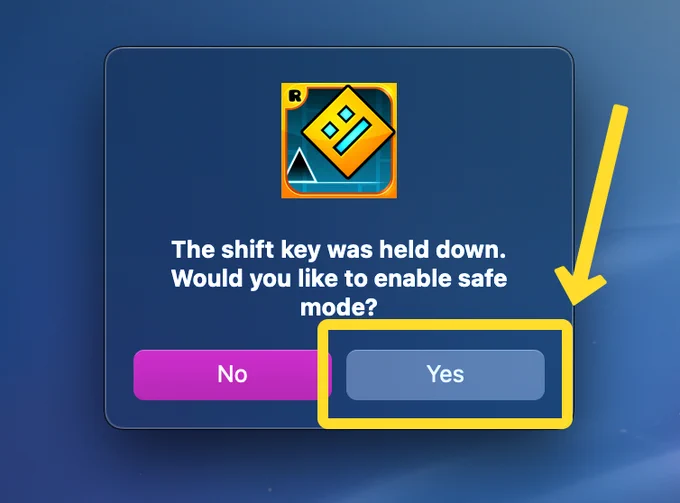 screenshot showing the safe mode prompt on macOS. an arrow is pointing to the yes button to indicate that it should be pressed