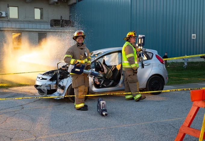 Two Lakeshore Firefighters doing Auto Extrication Demonstration. 