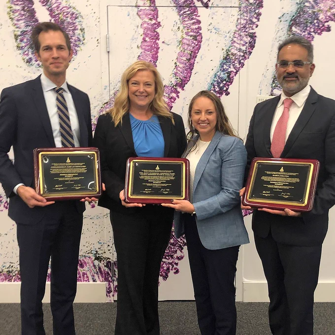 ScienceLIVE co-founders Angela Messmer-Blust, PhD; Mary Pickering, PhD, flanked by other award winners