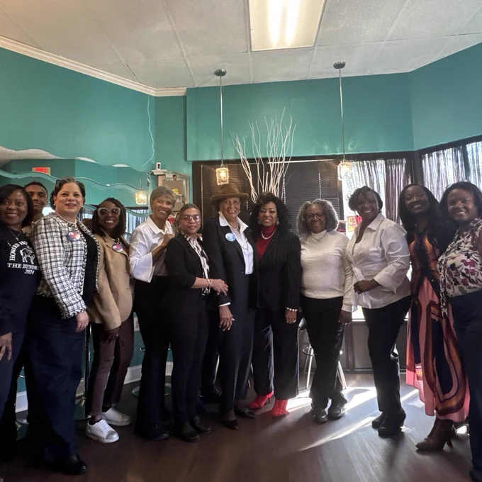 Photo of Reps. Yvette Clarke, Alma Adams, me, and other attendees at the Fourth Ward Barber & Hairstyling Salon in Charlotte.