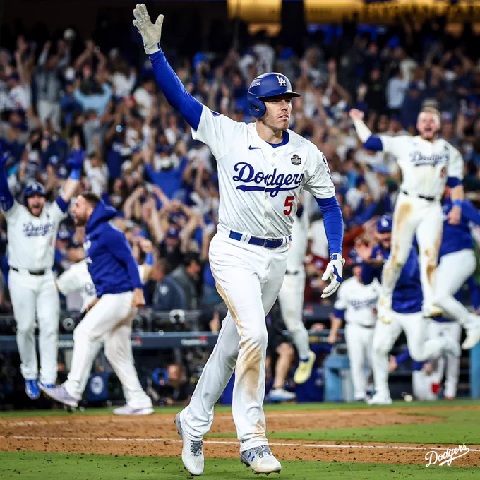 Freddie Freeman puts his hand up in the air after hitting a walk-off grand slam.