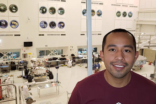 Luis Dominguez working in NASA's' lab. 