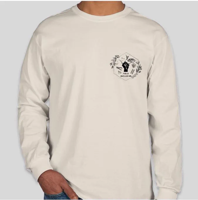 The front of the crème colored shirt sporting our official FI logo in the upper left.