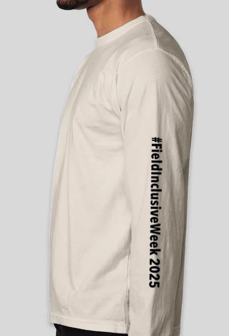 The Field Inclusive Week 2025 hashtag going down the left sleeve of the shirt.