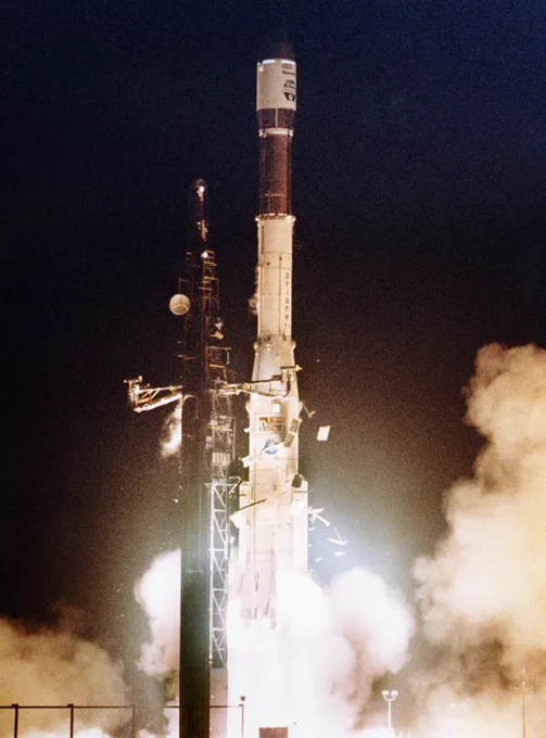 Ariane 3 flight V11 carrying the Marecs B2 satellite lifts off from the launch pad into the night sky. The smoke and flames from the rocket can be clearly seen as it clears the launch pad.