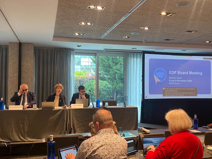 EDF President, Executive Director and Deputy Director presenting.