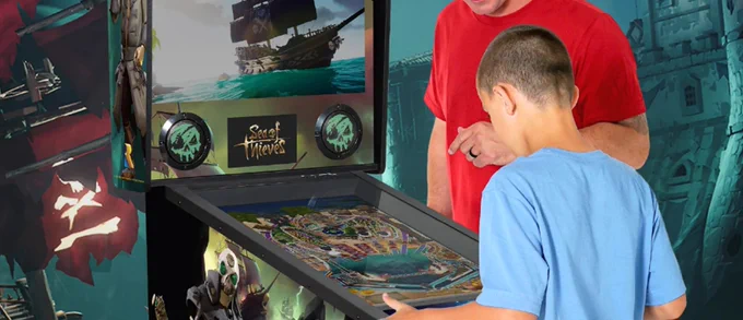A child plays the Legends Pinball: Sea of Thieves machine.