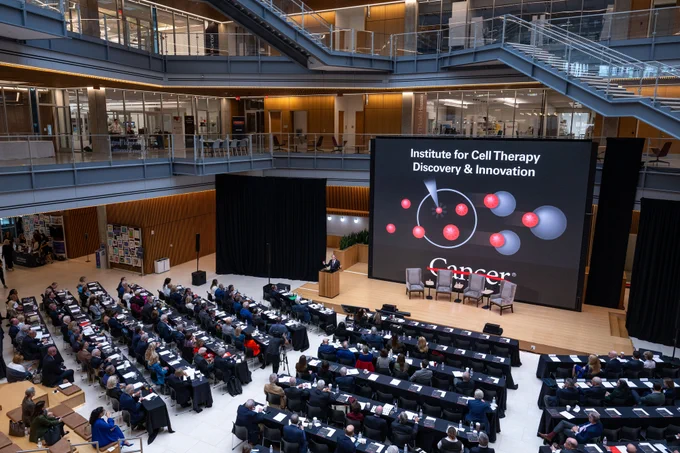 Wide crowd shot of institute launch event