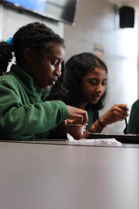Two students eating lunch. 