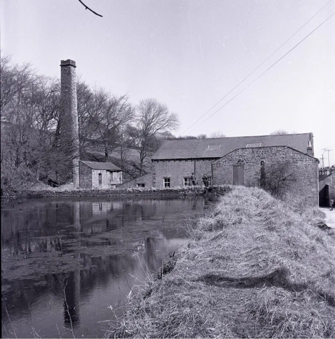 Black and white photograph showing Narrowgates Mill, Barley and a tall chimney