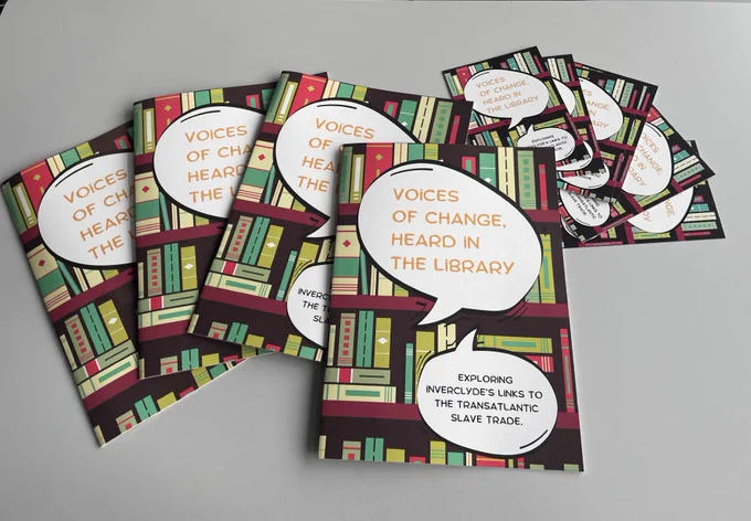 Copies of the book Voices of Change, Heard in the Library